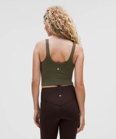 When Feeling Nothing Is Everything. The Lululemon Align Collection, Powered By Nulu Fabric, Is So Weightless And Buttery Soft, All You Feel Is Your Practice. Designed For Yoga. Sizes 0-14 Fit A/b Cups:sizes 16-20 Fit C/d Cups:tight Fit Contours Your Body:cropped Length Is Cut Above The Waist-Perfect With High-Rise Pants:intended For Low-Impact Activities. Built-In Shelf Bra For Added Support And Coverage. Pockets For Optional, Removable Cups. | Lululemon Align™ Tank Top Light Support, A/B Cup Lululemon Racerback Stretch Tank Top, Lululemon Yoga Tank Top, Lululemon Align Tank Waist Length, Lily Lemon Align Tank, Lululemon Sleeveless Tank Top With Built-in Bra, Lululemon Align Tank, B Cup, Lululemon Align, Social Impact