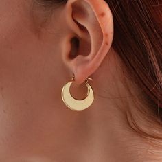 14 Carat Gold Crescent Model Earrings 14 Carat (585) Gold Weight: 2,25 gr. Color: Yellow. The size of the earring is average 2 cm. A great piece to add to every outfit! chains that you can combine with your clothes with the elegance of İpek Silver! * Product Detail Product Content: 14k Gold All our products are sent with İPEK SİLVER Guarantee. Since our products are handcrafted, there may be + - 5% deviation in mine weights. The product are sent with a gift box, package and a gift note of your choice. Your products are sent with the gift box, package and note of your, with the İpek Silver guarantee. *I will put your jewelry in a nice and secure package in order to make sure that it will be delivered to your address safely. This is definitely the perfect gift for him or her. *JEWELERY GIFTS Elegant Gold Half Moon Hoop Earrings, Elegant Half Moon Gold Hoop Earrings, Tarnish Resistant Crescent Hoop Earrings, Gold Hoop Jewelry With Moon Phase Detail, Celestial Style Yellow Gold Round Hoop Earrings, Modern Crescent Jewelry For Pierced Ears, Celestial Yellow Gold Round Hoop Earrings, Minimalist Crescent Hoop Earrings, Celestial Style Yellow Gold Hoop Earrings