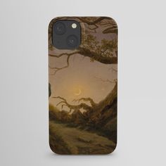 a phone case with an image of a tree and the moon in the sky above it