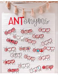 an art project with paper cut out animals and the words ant syyms written on it