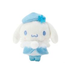 a white and blue stuffed animal with a hat on it's head, standing in front of a white background