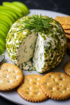 a cheese ball and crackers on a plate