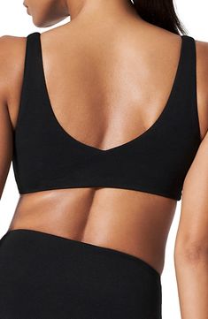 Stay-put straps lend support to this pullover piqué bikini top to keep you feeling confident by the water. Lined, with removable cups 91% nylon, 9% elastane Machine wash, dry flat Imported Functional Black Swimwear With Built-in Bra, Black Athleisure Swimwear With Seamless Construction, Sporty Black Swimwear With Seamless Construction, Black Triangle Top Sports Bra, Stretch Triangle Top With Seamless Construction, Black Sporty Triangle Top Sports Bra, Sporty Black Triangle Top Sports Bra, Stretch Seamless Triangle Top, Black Triangle Top With Adjustable Straps