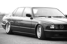 a black and white photo of a bmw