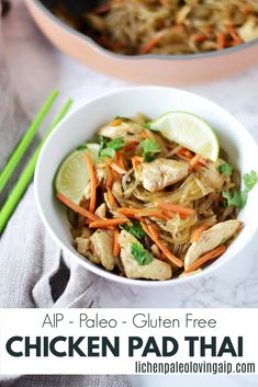 chicken pad thai stir fry in a bowl with chopsticks next to the dish