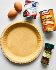 ingredients to make pumpkin pie laid out on a table