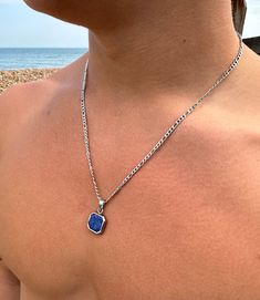 "🌊Ocean Jewel. Selling High-Quality Handmade Jewellery that lasts a lifetime 🌊 100% Stainless steel ✔️ Tarnish proof ✔️  Will not discolour ✔️  Free UK first class delivery ✔️  A listing comprised of OceanJewels best selling pendants. 🌊OceanJewel's Royal Blue Lapis Lazuli Stone Pendant  🌊OceanJewel's White Pearl Shell Stone Pendant  🌊OceanJewel's Black Onyx Stone Pendant Each pendant is combined with a 3mm Figaro Necklace made of stainless steel.    Available in lengths of 14\" 16\" 18\" 20 Male Necklace Pendants, Celebrity Necklace, Bling Ideas, Blue Stone Pendant, Blue Pendant Necklace, Mens Necklace Pendant, Blue Sapphire Necklace, Lapis Lazuli Pendant