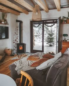 a living room filled with furniture and a fire place