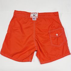 Vtg Birdwell Beach Britches Men's Size 30-31 Board Shorts Bright Red Orange Usa. Bright Red/Orange Color! Size Tag Is Washed But Measurements Would Indicate The Size Would Have Been Around 30-31 As Shown Tied In The Photo. Above The Knee, High Waisted Style, No Stretch In The Waist. Measurements Below To Ensure Proper Fit! Weighs: 4.7oz Measurements, Laying Flat: Waist Width, Edge To Edge: 15.5” Inseam: 5” Outseam (Side Length Top To Bottom): 15.5” Rise: 12” Orange Summer Swim Trunks, Orange Short Length Swim Trunks For Vacation, Orange Swim Trunks For Beach, Orange Short Swim Trunks For Beach, Orange Short Length Swim Trunks For Beach, Casual Orange Swim Trunks For Beach, Casual Orange Swim Trunks Short Length, Casual Orange Swim Trunks, Casual Orange Short Swim Trunks