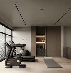 there is a gym with exercise equipment in the room