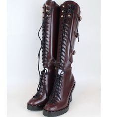 Size: Eur 37 Color: Burgundy Condition: New With Box The Box Was Broken As Shown In Photos. Msrp: $2898 Description: Knee Boots Leather Lace-Up Front Cutouts Buckled Straps Round Toe Zip Fastening Along Side Rubber Lug Sole Made In Italy Heel Height: 4.09 Inches Platform Height: 0.98 Inches ***To Guarantee The Condition Of The Item And That You're Getting Exactly What You Ordered, I Videotaped Myself Packaging Items For Shipment. Punk Style Leather Knee-high Lace-up Boots, Luxury Calf Leather Combat Boots With Lace-up, Luxury Edgy Lace-up Boots With Reinforced Heel, Luxury Lace-up Platform Boots In Calf Leather, Dark Red Boots, Red Combat Boots, Luxury Calf Leather Combat Boots With Lace-up Fastening, Ranch Boots, Valentino Boots