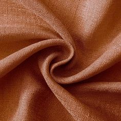 a close up view of an orange fabric