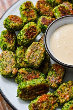 broccoli bites with dipping sauce on a plate