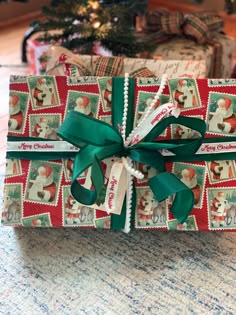 a wrapped christmas present sitting on top of a table