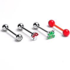 three pairs of surgical steel belly rings with red and green balls on each one side