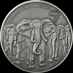 an elephant coin with three elephants on it