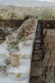 a long table is set up with place settings