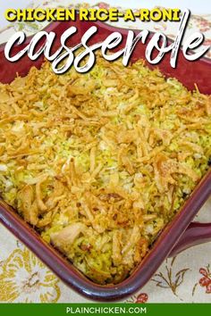 a casserole dish with chicken and rice in it on a floral table cloth