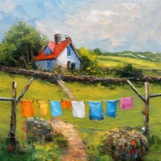 a painting of clothes hanging out to dry in front of a country house with a red roof