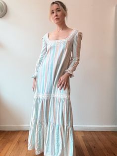 Pastel striped cotton maxi dress. With crocheted trim throughout.  Very full and tiered. Scooped neckline and back. Pull over style, no closure. With a 1970s Saks Fifth Avenue label.  Best for a size extra small to small  31"/32" bust 44" hip 52" length In excellent vintage condition, normal wear, no flaws to note 1970s Maxi Dress, 80's Clothes, Cotton Maxi Dress, 80s Outfit, Scooped Neckline, Cotton Maxi, Maxi Dress Cotton, Dress Clothes For Women, Vintage 1970s