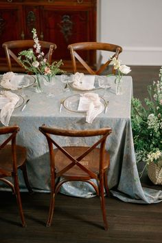 the table is set for two with place settings