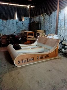 an inflatable boat sitting inside of a garage