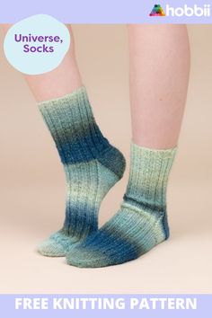 there is a woman's legs wearing socks with blue and green stripes