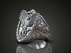 Discover the perfect blend of artistry and spirituality with this Handmade 925K Silver Archangel Saint Michael Ring. Expertly crafted with meticulous attention to detail, this exquisite ring features the revered image of St. Michael, symbolizing protection, divine guidance, and unwavering faith. Its timeless design makes it an elegant and meaningful addition to any jewelry collection. Ideal for those who appreciate Christian jewelry, this ring seamlessly complements everyday wear and special occ Christian Ring, Divine Guidance, Saint Michael, 1st Anniversary Gifts, Dragon Wings, 21st Birthday Gifts, Personalized Pendant, 50th Birthday Gifts, Christian Christmas