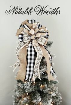 a christmas tree decorated with burlock and ribbon