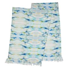 two scarfs with blue and green designs on them