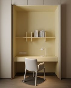 a white desk and chair in a room