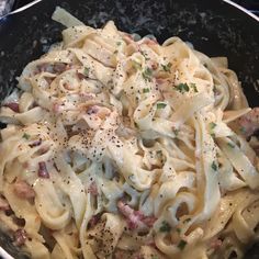 the pasta dish is prepared and ready to be eaten in the skillet on the stove