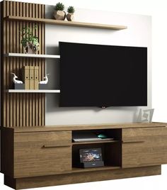 an entertainment center with a flat screen tv mounted on it's side and shelves