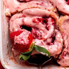 a close up of a plate of food with strawberries