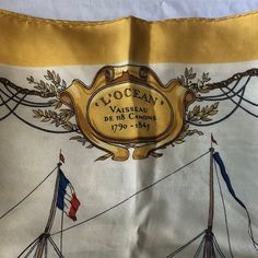 Vintage Hermes Scarf - L’ocean Vaisseau De 118 Canons 1790 - 1845 Depicting A French Ship On An Off-White Background With A Yellow Border. Approx 33” X 34”. Note: There Are A Few Blemishes Which I Have Tried To Capture In The Photos. (123) Hermes Scarf Shirt, Vintage Hermes Scarf, Scarf Shirt, Vintage Hermes, Hermes Scarf, Canon, White Background, Scarf Accessory, Women Accessories