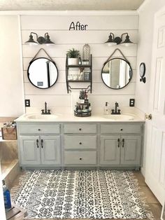 a bathroom with two sinks and three mirrors on the wall above them is decorated in black and white