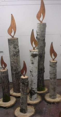 several pieces of wood that have been turned into firewood with different shapes and sizes