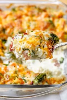 a spoon full of broccoli and cheese casserole