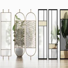 an assortment of mirrors and planters in various shapes, sizes and colors on a wooden floor