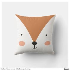 a pillow that has a fox face on it