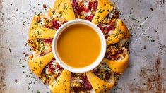 an overhead view of some food and a cup of soup