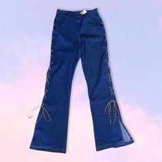 Vintage 90s y2k lace up jeans. The cutest faux suede lace up detail along the legs on each side. Perfect condition! Stretchy flattering denim. Cotton spandex mix. Fits like a small.  26" waist  10" rise  38" hip  30" inseam Lace Up Flare Jeans, Lace Up Jeans, Y2k Jeans, Denim Cotton, Suede Lace, Womens Jeans, Cotton Spandex, Flare Jeans, The Cutest