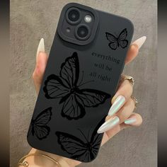 a woman's hand holding an iphone case with butterflies on it and the words everything will be alright