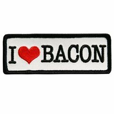 i love bacon iron - on patch in white and black with red heart embroidered onto it