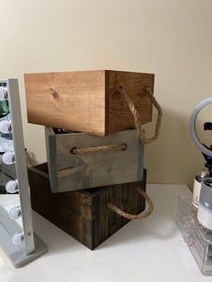 a stack of wooden boxes sitting on top of a table