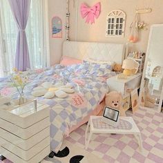 a bed room with a neatly made bed and a teddy bear