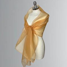 A very elegant organza shawl for your wedding party or evening dress Made of luxury organza with a beautiful shimmer! Color: gold / golden/ mustard ( other colors are available, please ask) Size : 200 cm x 50 cm approx. You can use it as a wrap, shawl or stola. We accept credit cards , paypal or bank transfers! Elegant Silk Scarf For Spring Party, Elegant Silk Shawl Scarf For Wedding, Chic Silk Scarf For Wedding In Summer, Chic Silk Scarf For Summer Weddings, Gold Silk Scarf Shawl For Gift, Elegant Shawl For Summer Parties, Elegant Silk Scarf For Summer Party, Elegant Silk Scarf For Summer Weddings, Elegant Sheer Silk Scarf For Formal Occasions