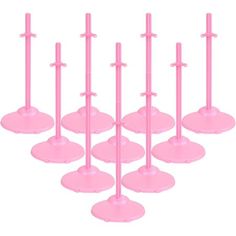 set of six pink plastic pedestals with metal poles on each side and one in the middle