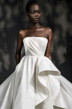 a woman in a white wedding dress