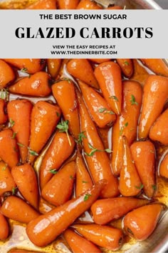 carrots are being cooked in a pan with brown liquid and parsley on top